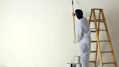 painting-contractor-painting-with-a-roller.jpg